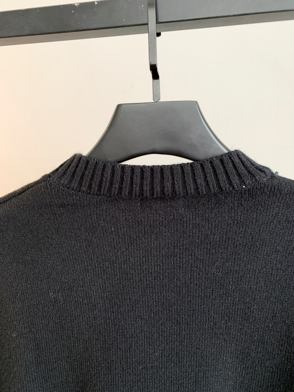Black Fendi sweater ribbed collar and upper back