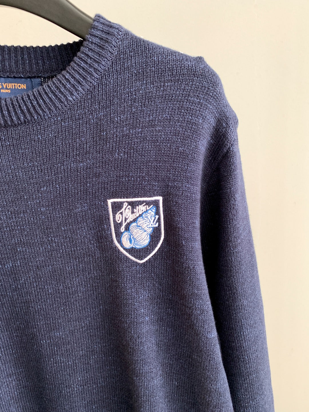 Louis Vuitton knit sweater in dark blue with small crest emblem on chest