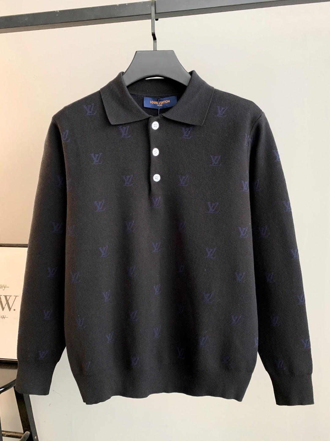 Long-sleeve polo sweater in dark gray with blue monogram pattern, button placket