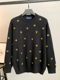 Long-sleeve knit sweater, dark with gold monogram and LV logo allover.