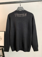 Dark knit long-sleeve sweater with rhinestone logo on the back