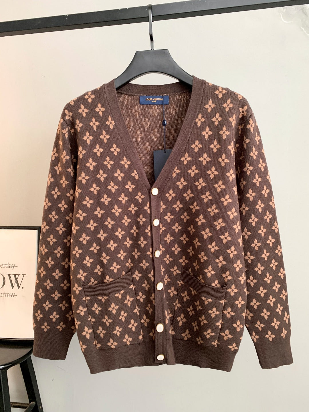 Brown monogram cardigan with front buttons and two flap pockets