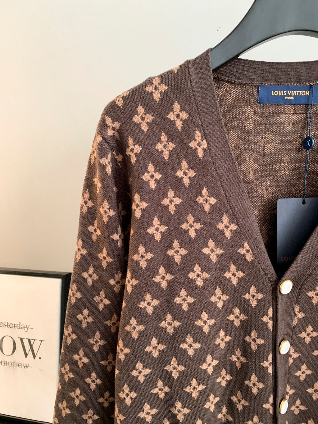 Brown monogram cardigan detail with V-neck and button closure