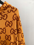 Gucci GG monogram knit sweater side profile, orange knit