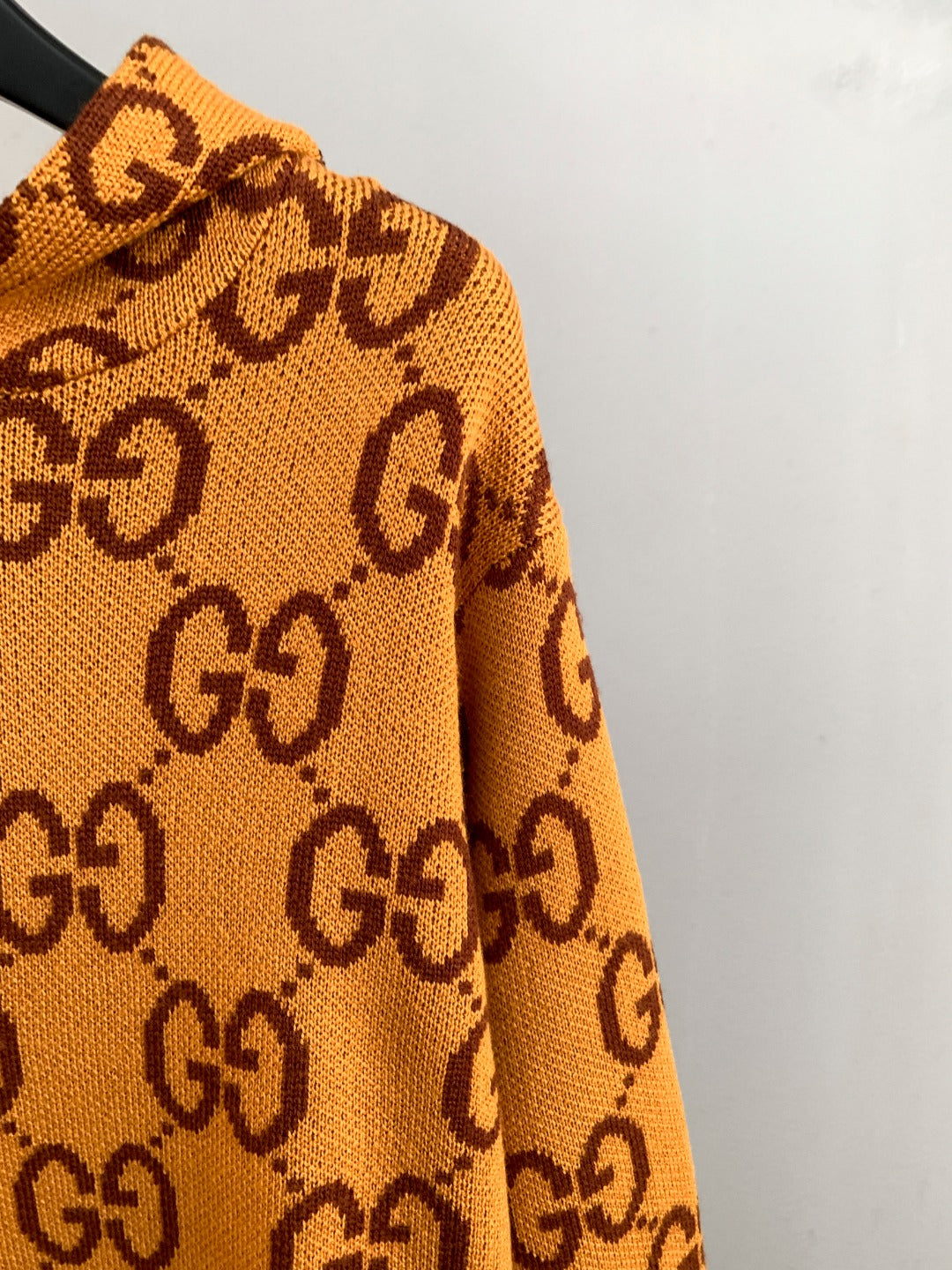 Gucci GG monogram knit sweater side profile, orange knit