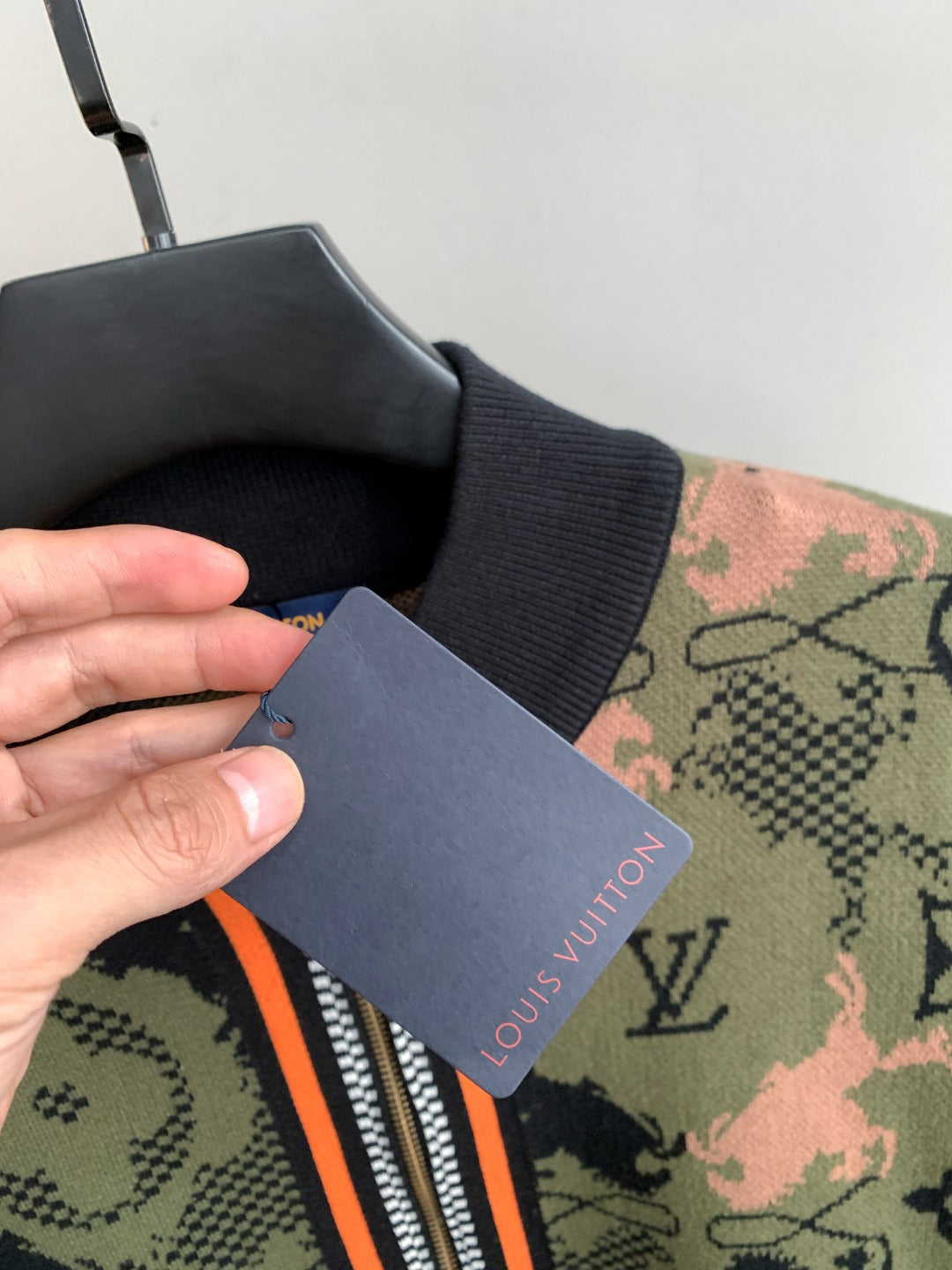Louis Vuitton zip-up jacket sleeve and zipper, ribbed cuffs, camo monogram print
