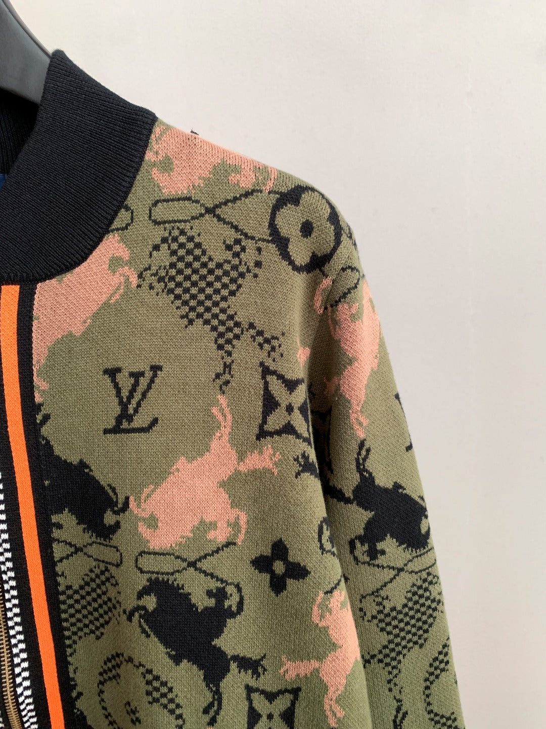 Louis Vuitton zip-up jacket sleeve detail, camo monogram print, ribbed cuffs