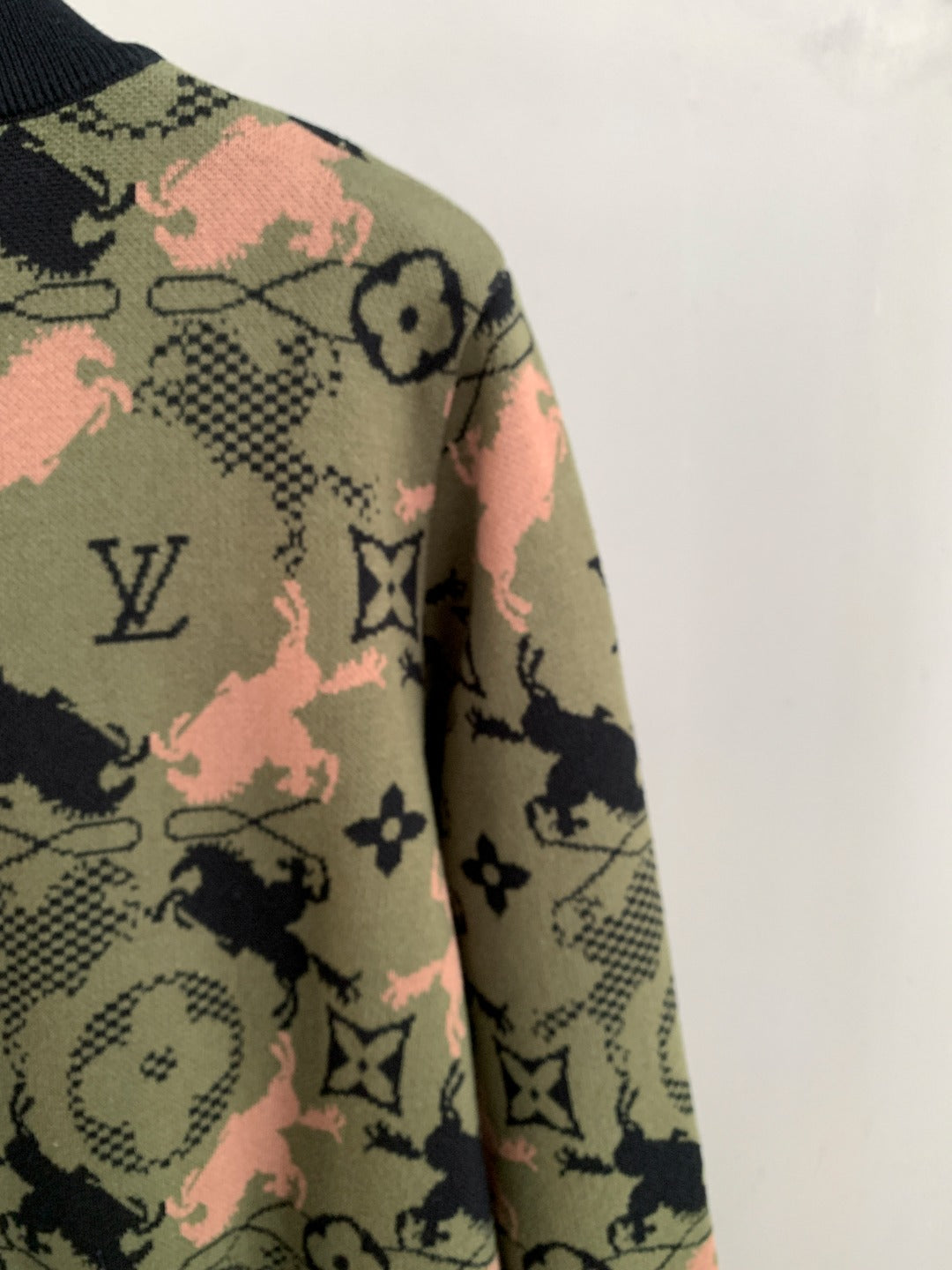 Louis Vuitton monogram zip-up jacket side, multicolor camo pattern with dark logos