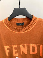 Fendi orange sweater neckline with FENDI knit lettering detail