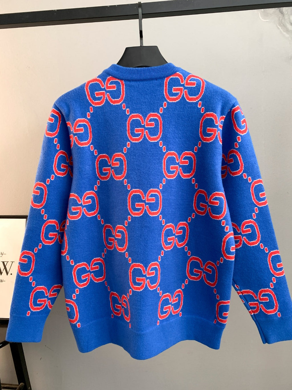 Blue knit sweater with allover red and white GG pattern, long sleeves