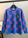 Gucci long-sleeve knit sweater in bright blue with red GG pattern and small green graphic