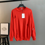 Dior red knit sweater with crew neck and front Dior hang tag
