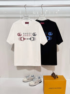 Pair of Gucci crewneck T-shirts: white and black, both with front logo graphic