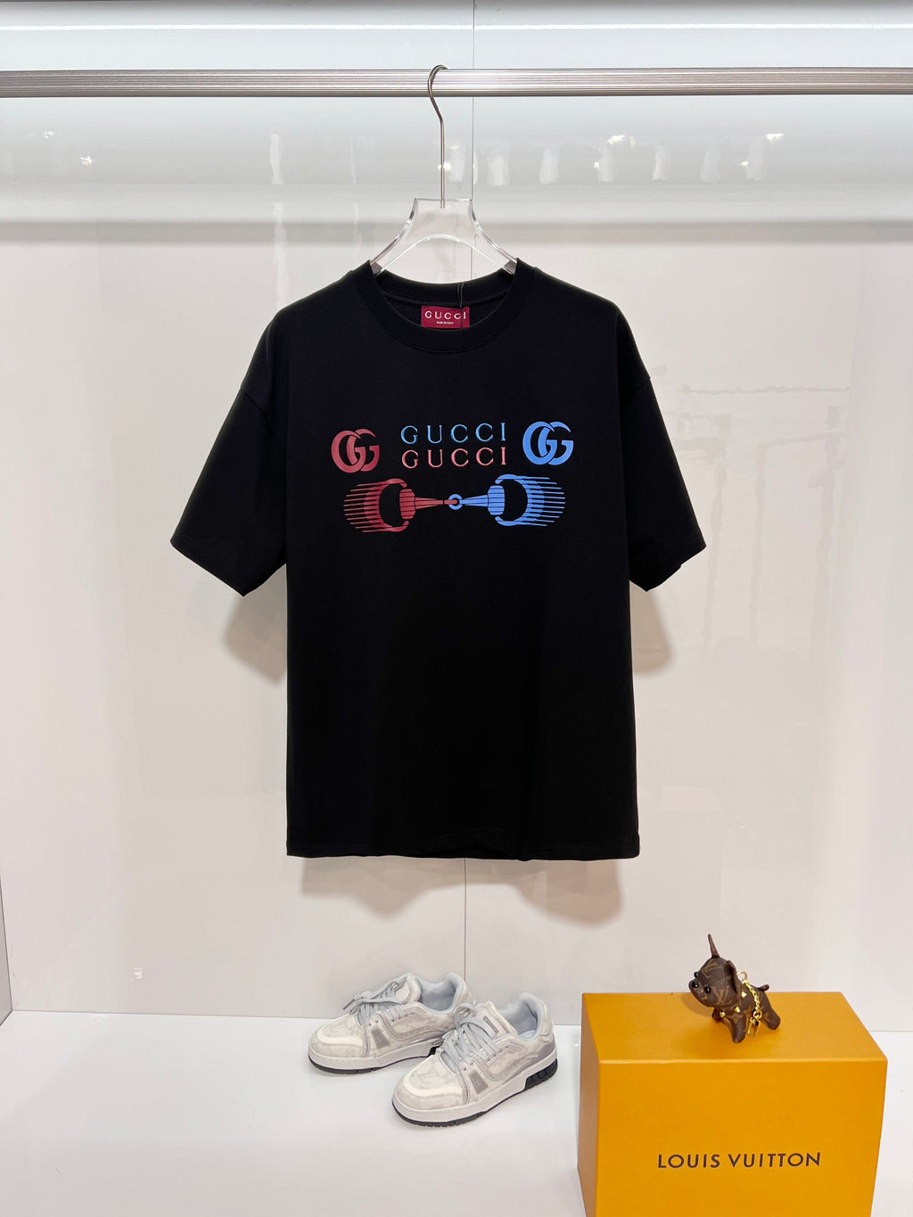Black Gucci T-shirt with colorful GG print and horse-bit style graphic on chest
