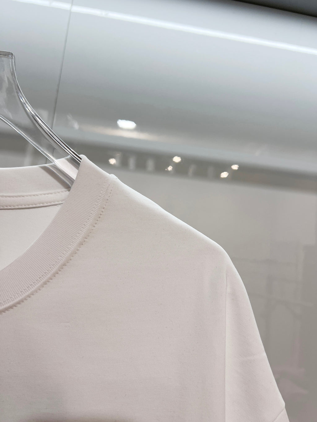 White T-shirt shoulder seam close-up