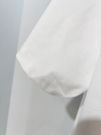 White T-shirt fabric and sleeve seam detail