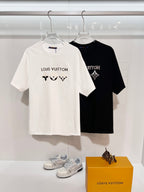 White and black Louis Vuitton T-shirts with logo graphic on chest, short sleeves