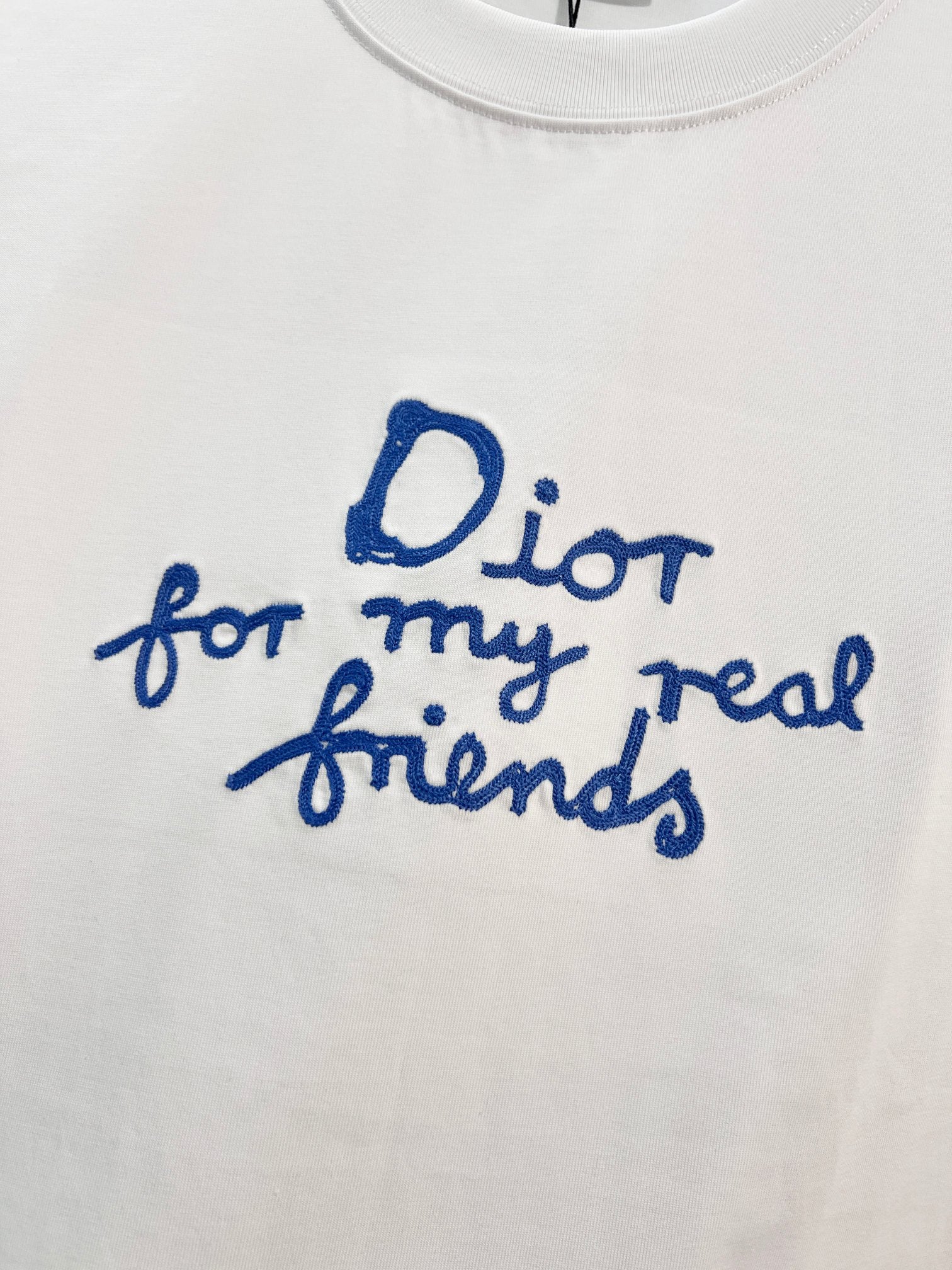 White Dior short-sleeve T-shirt with blue script 'Dior for my real friends'