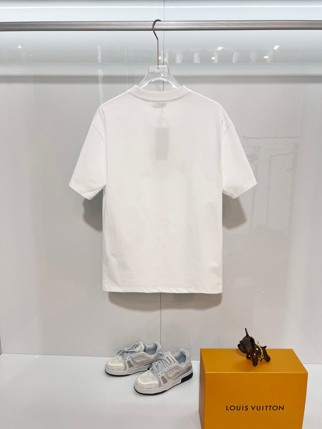 White Dior short-sleeve T-shirt, plain back view on hanger