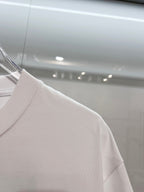 White Dior short-sleeve T-shirt shoulder and sleeve side view