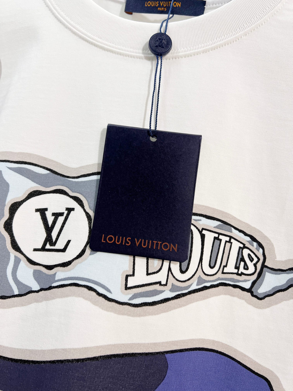 White Louis Vuitton T-shirt crew neck with hanging tag and graphic print detail