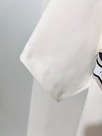 White Louis Vuitton T-shirt stitched sleeve seam close-up
