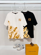 Fendi short-sleeve T-shirts, white and black, both with gold FJ graphic prints