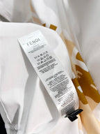 Fendi white short-sleeve T-shirt with care label tag near the side seam