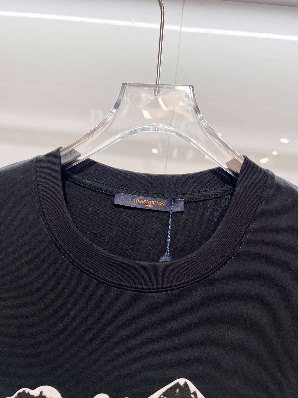 Louis Vuitton black T-shirt close-up of the crew neck and neckline label