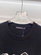 Louis Vuitton black T-shirt close-up of the crew neck and neckline label