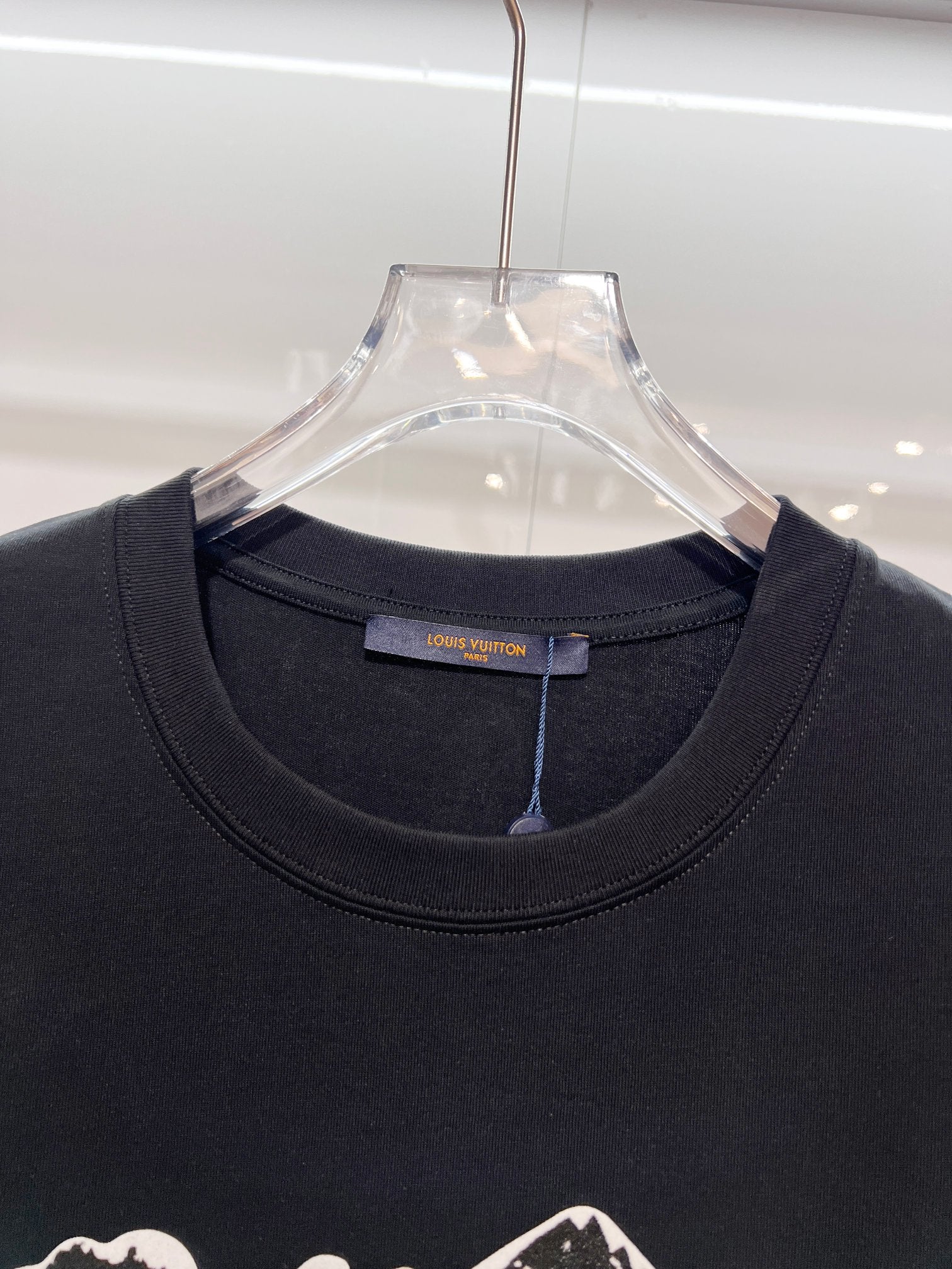 Louis Vuitton black T-shirt close-up of the crew neck and neckline label