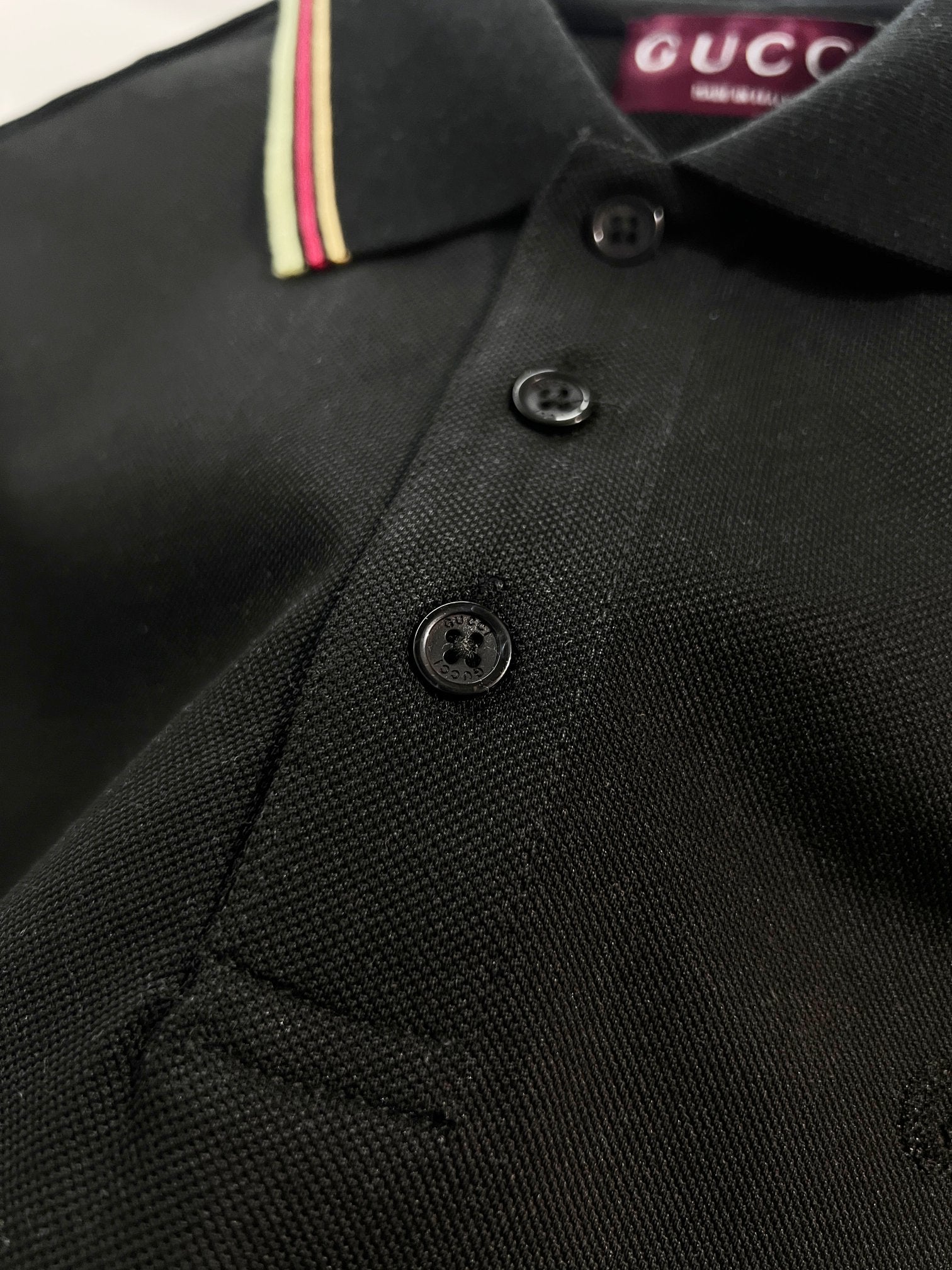 Gucci black polo shirt button placket with striped collar edge