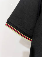 Gucci black polo shirt sleeve cuff with multicolor stripe trim