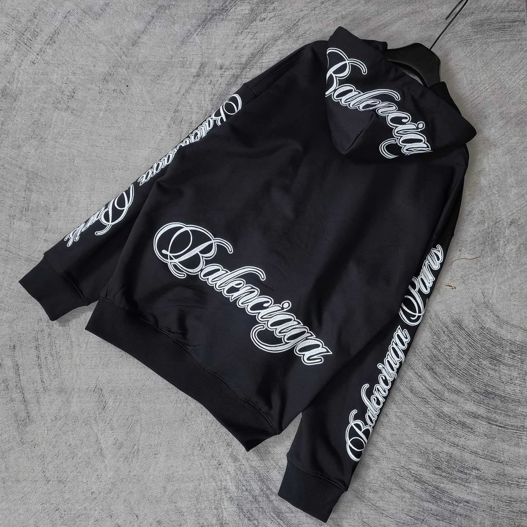 Balenciaga black hoodie with back logo and logo text along the sleeves