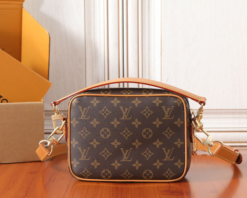 Louis Vuitton mini crossbody bag with brown monogram and tan leather edges