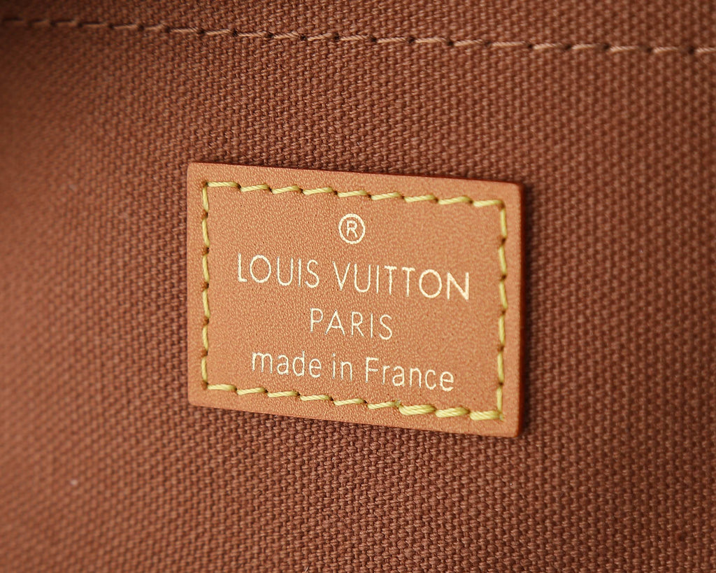 Louis Vuitton Paris made in France fabric label on brown bag
