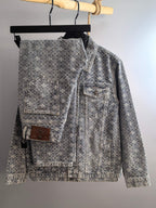 Gray long-sleeve denim jacket with light floral pattern, button front, chest flap pockets