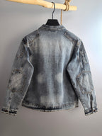 Denim jacket back view with curved yoke seam, light blue wash