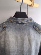 Denim jacket back collar with yoke seam, light blue wash
