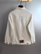 Burberry long-sleeve jacket, white back view with yoke seam and small plaid logo patch