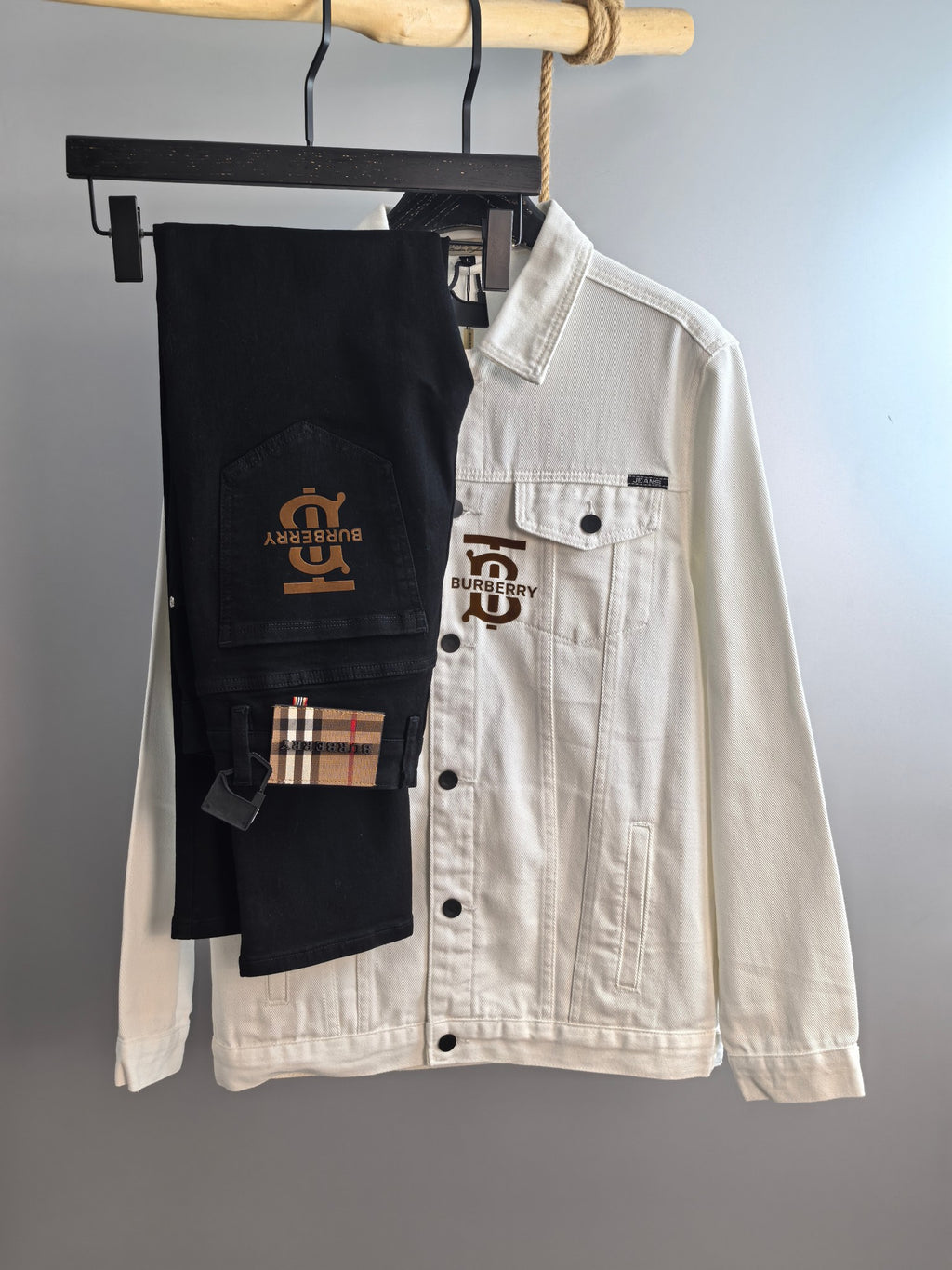 Burberry long-sleeve jacket in white with button front, flap chest pockets and logos