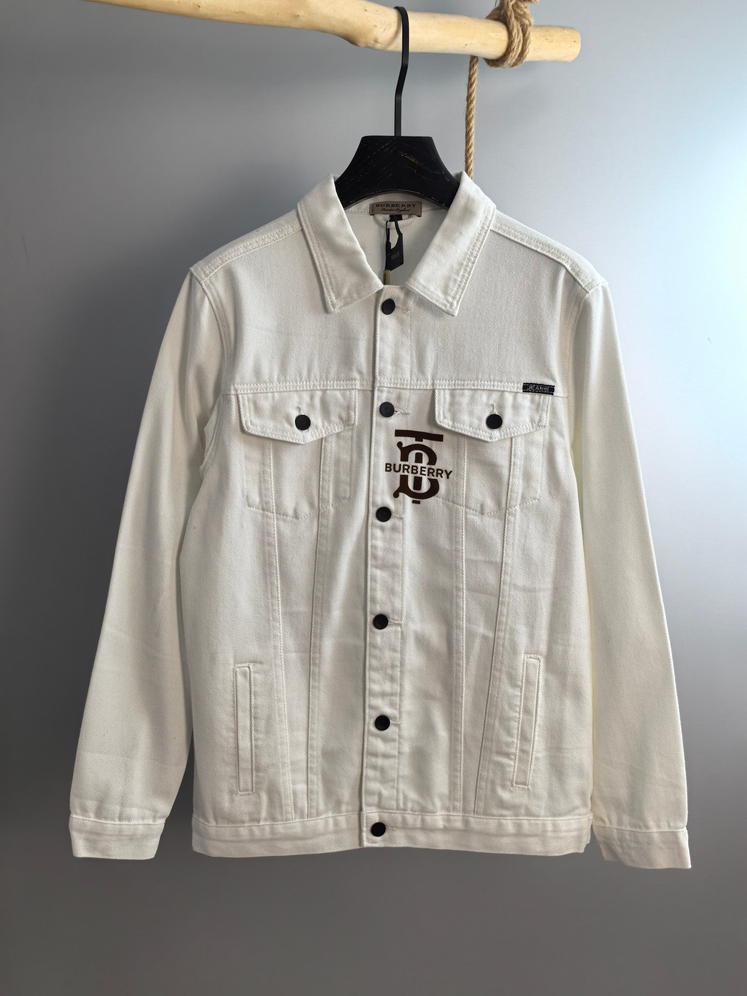 Burberry long-sleeve jacket, white button front with pointed collar and chest patch pockets