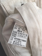 Burberry long-sleeve jacket white care label with fabric and washing instructions
