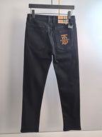 Burberry long pants, black denim with back pockets and stitched Burberry logo patch