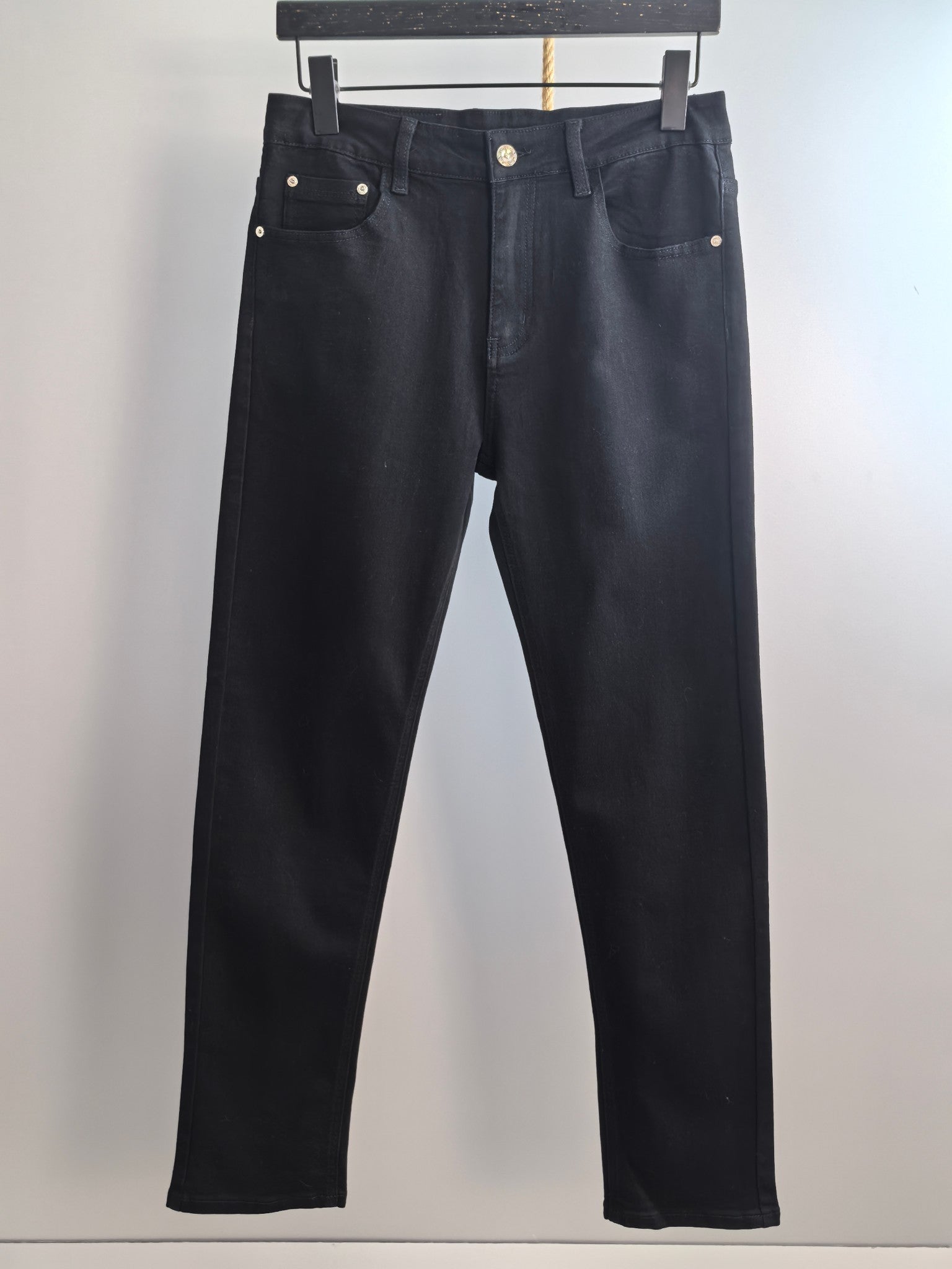 Burberry long pants, black denim with belt loops and front button closure