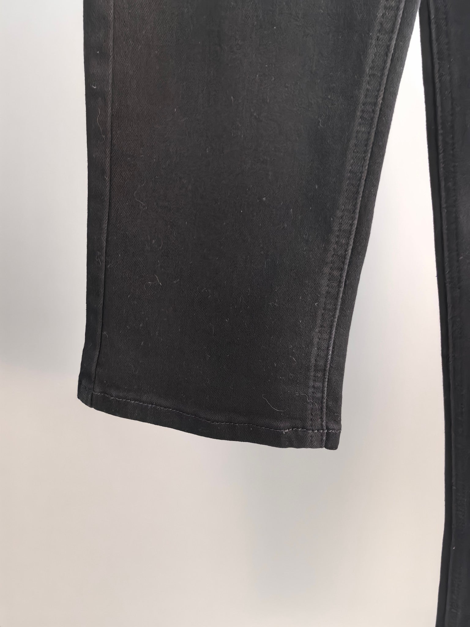 Burberry long pants, black denim leg hem with visible stitching