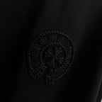 Black short-sleeve T-shirt with embossed circular crest logo