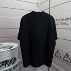 Black short-sleeve T-shirt with large circular front logo