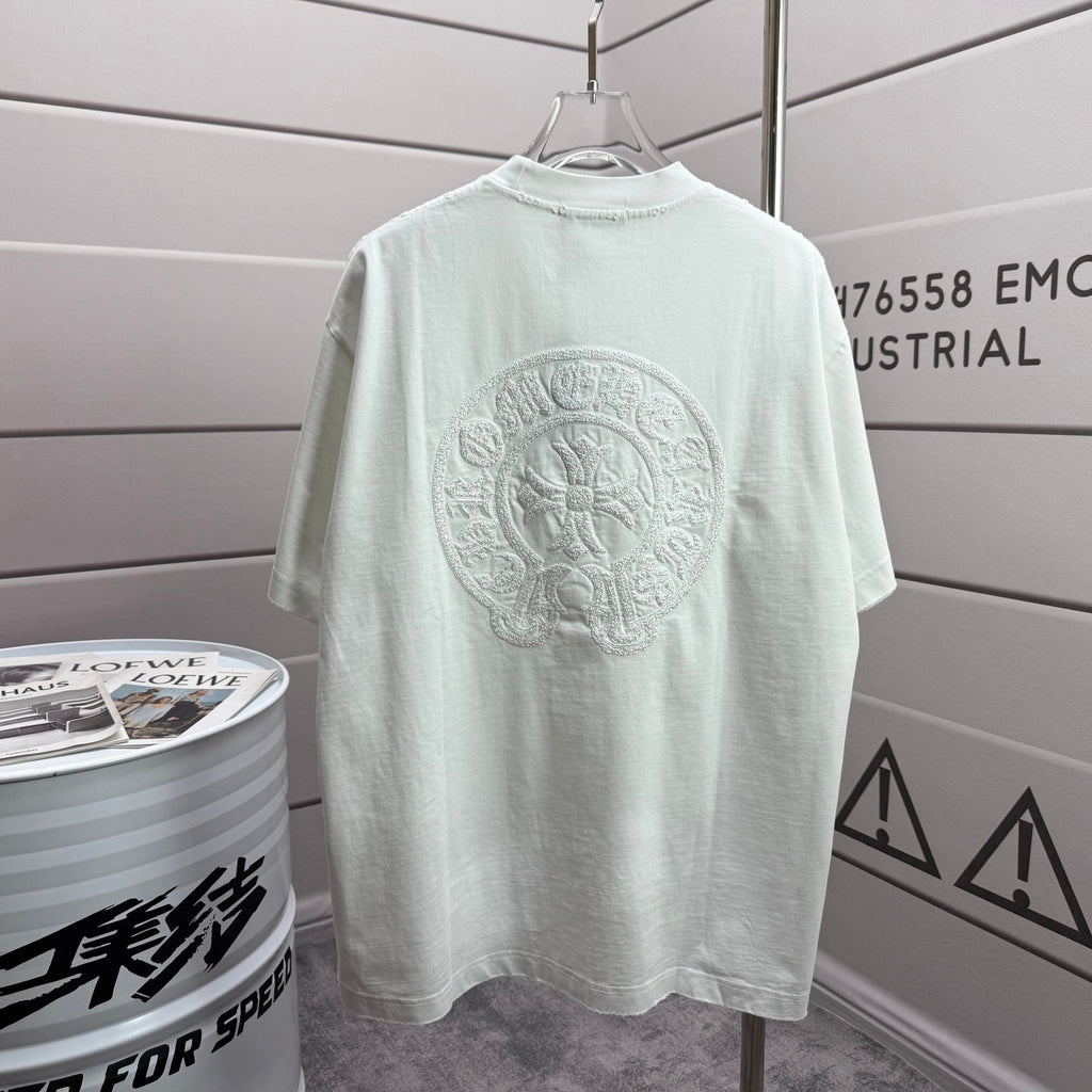 Light short-sleeve crewneck T-shirt with large circular embroidered back logo.