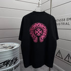 Black short-sleeve T-shirt with pink embroidered circular logo on chest